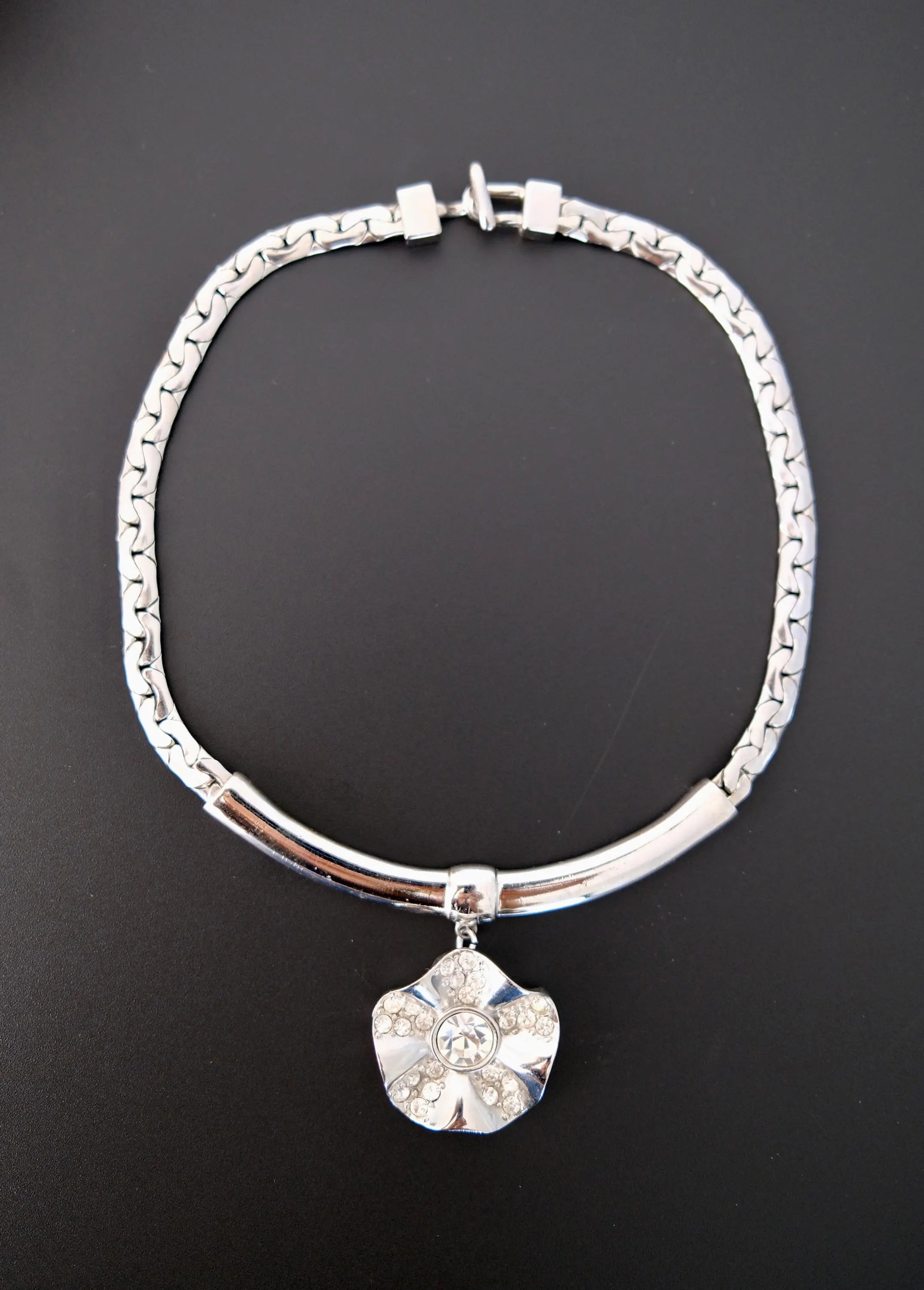 Vintage Givenchy silver-tone choker necklace with crystal flower statement centerpiece