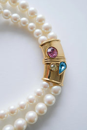 Vintage Givenchy pearl choker styled with dress timeless chic look