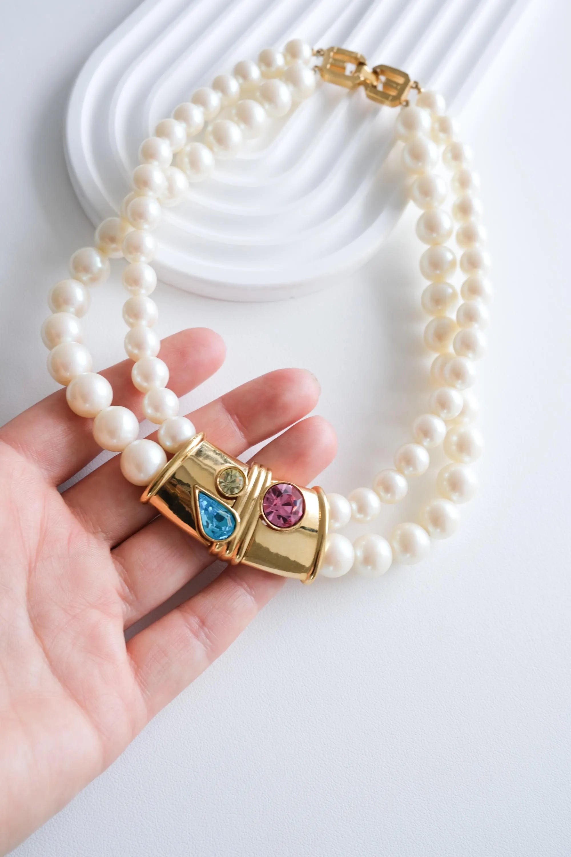 Vintage Givenchy pearl choker styled with dress timeless chic look