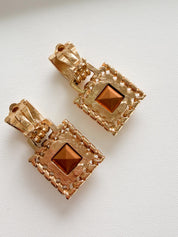Givenchy crystal dangle earrings on ear refined elegant style for women