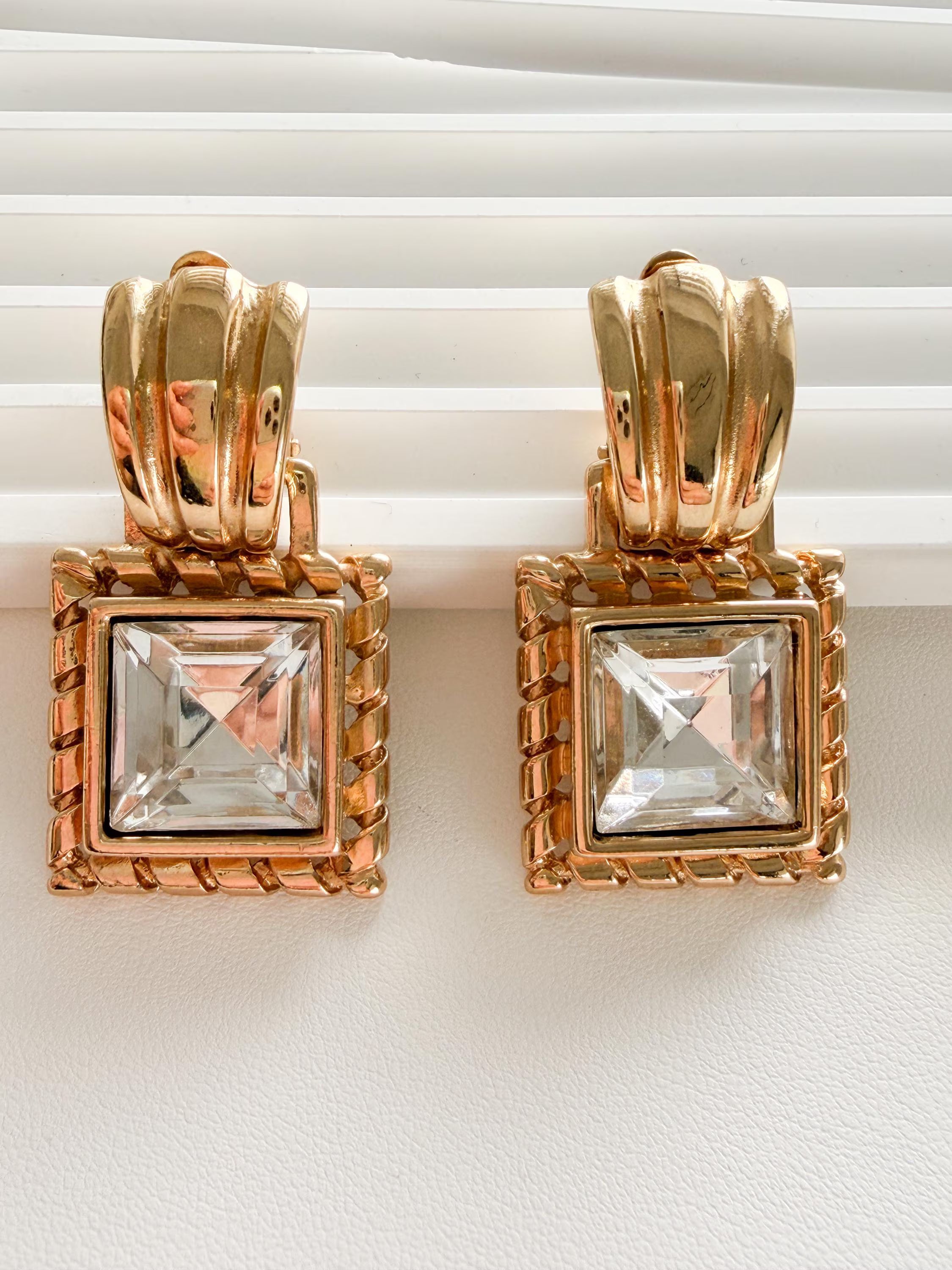 Givenchy crystal dangle earrings on ear refined elegant style for women