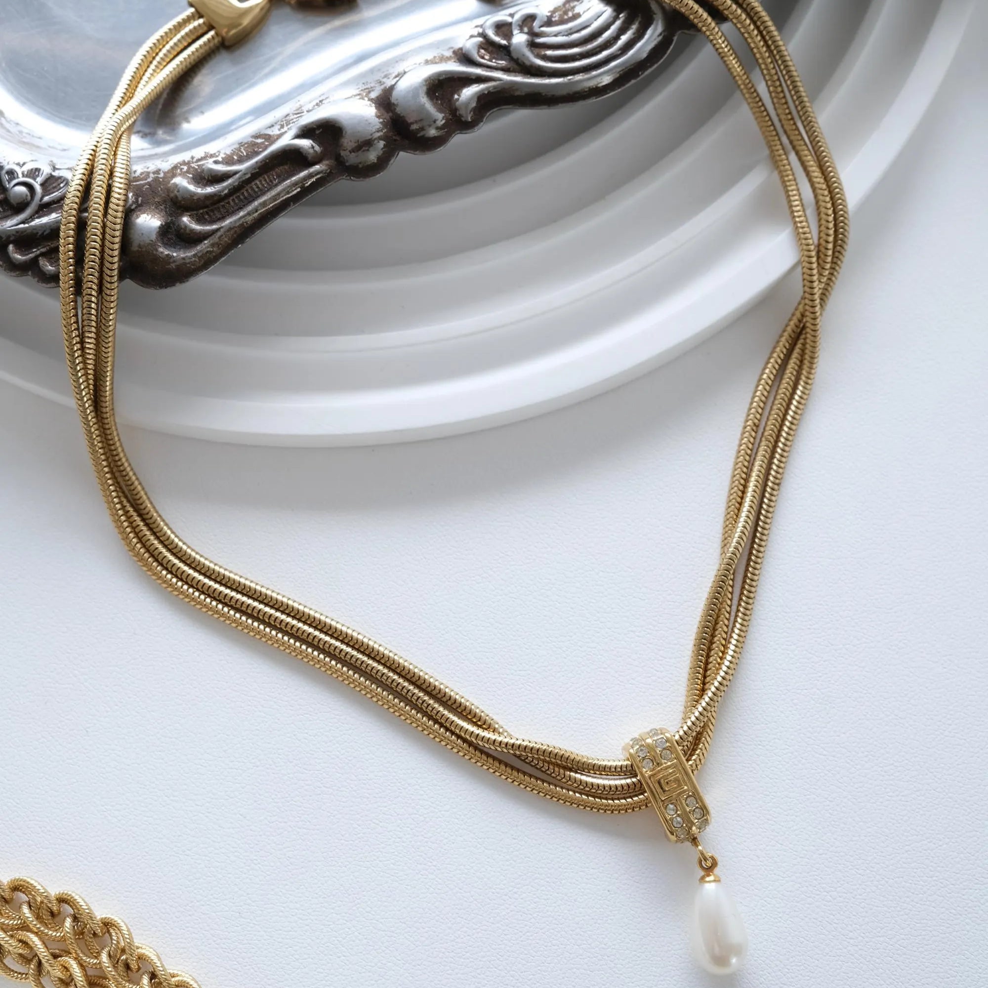 Vintage Givenchy gold faux pearl drop necklace with signed pendant elegant designer jewelry
