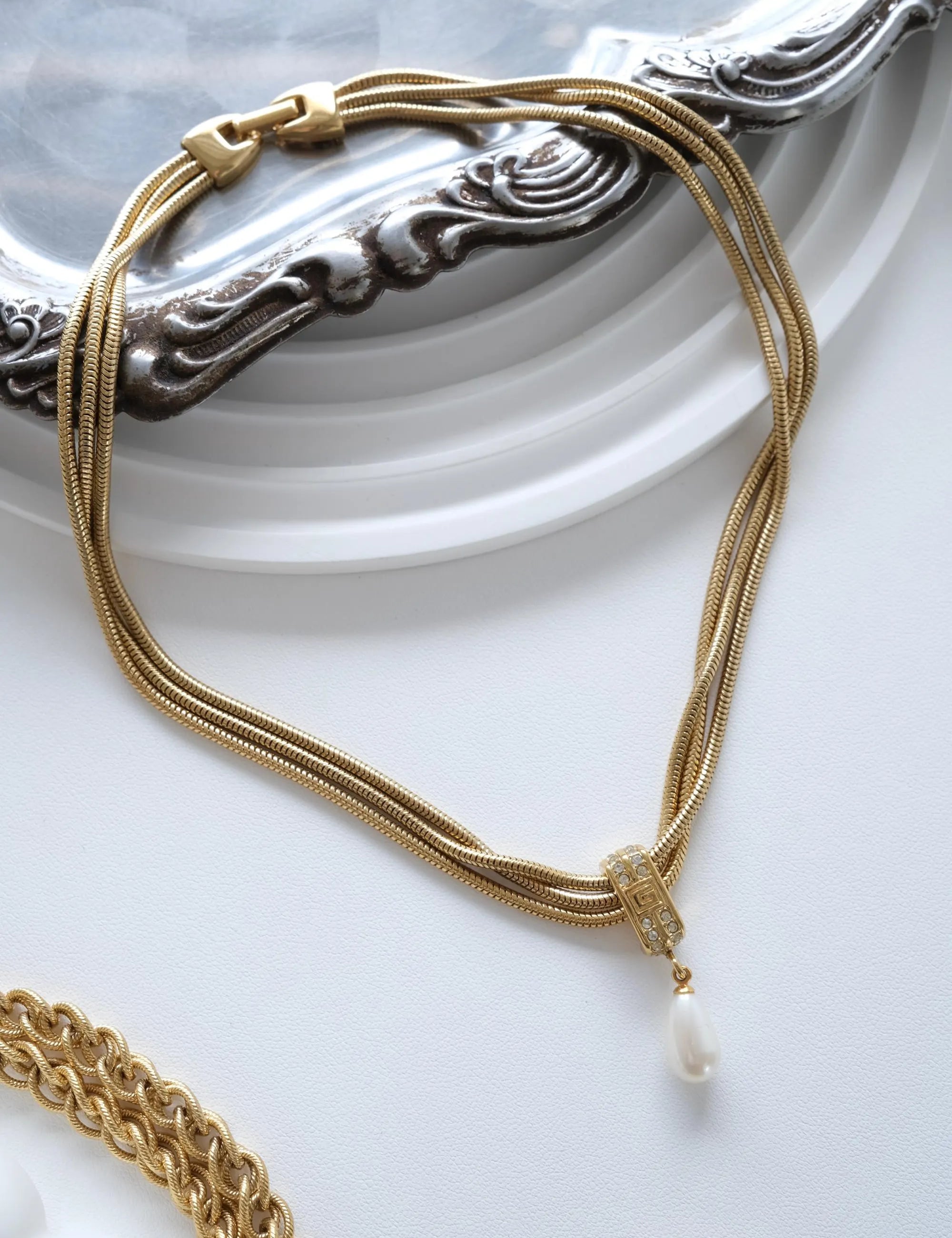 Vintage Givenchy gold faux pearl drop necklace with signed pendant elegant designer jewelry