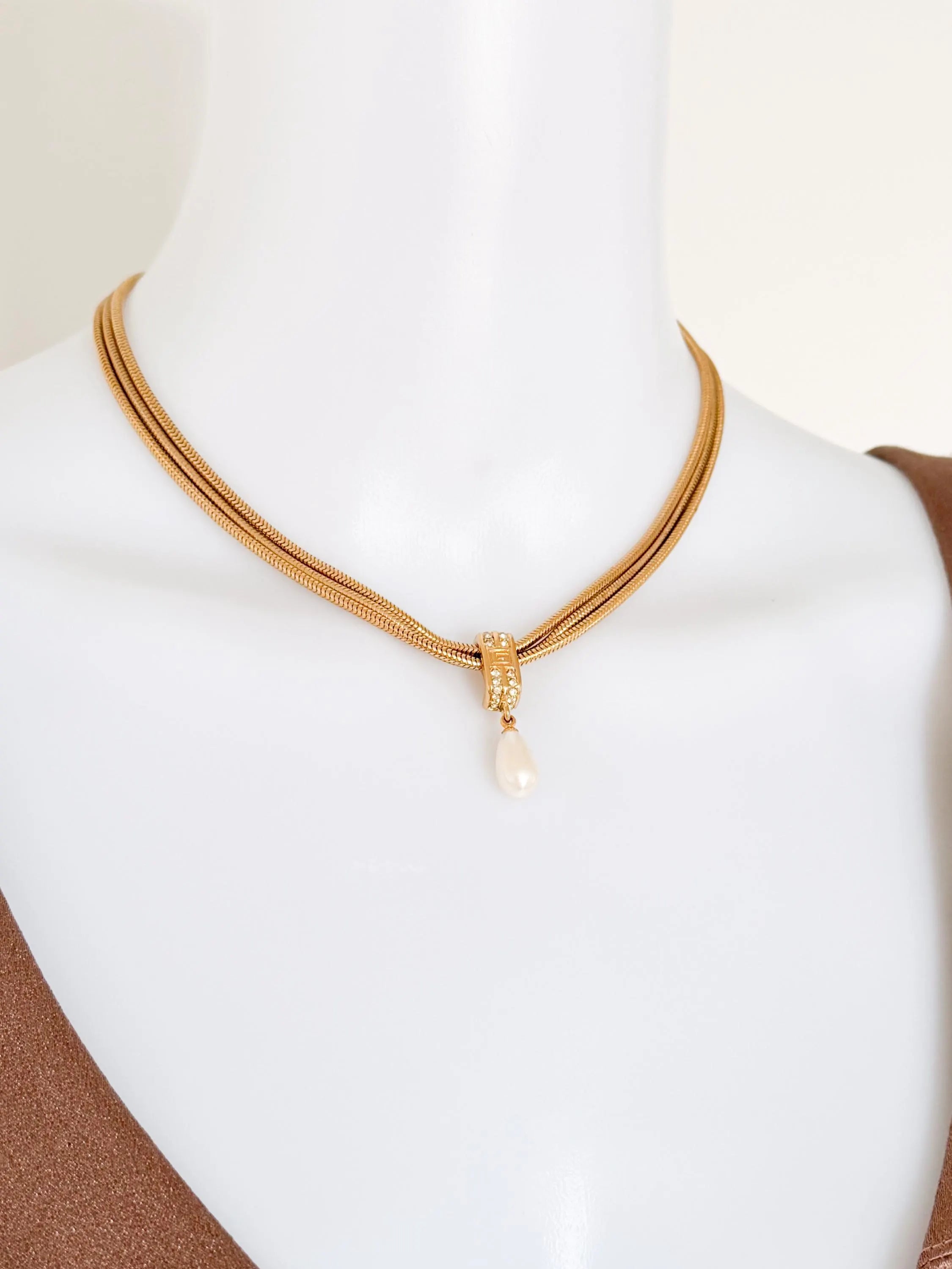 Vintage Givenchy gold faux pearl necklace styled with an elegant outfit for day or evening wear