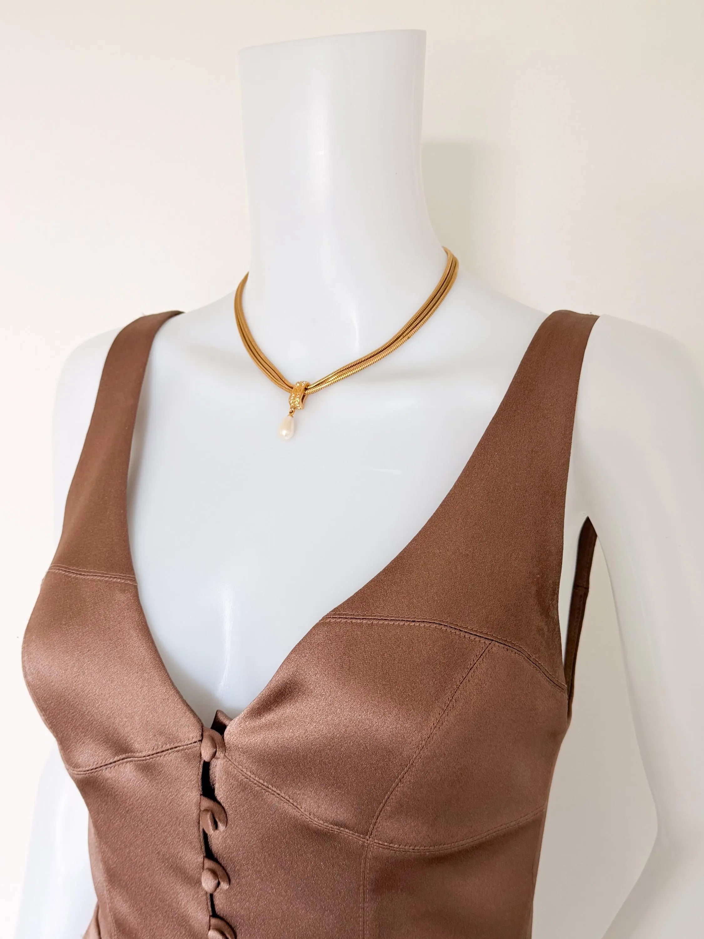 Vintage Givenchy gold faux pearl necklace styled with an elegant outfit for day or evening wear
