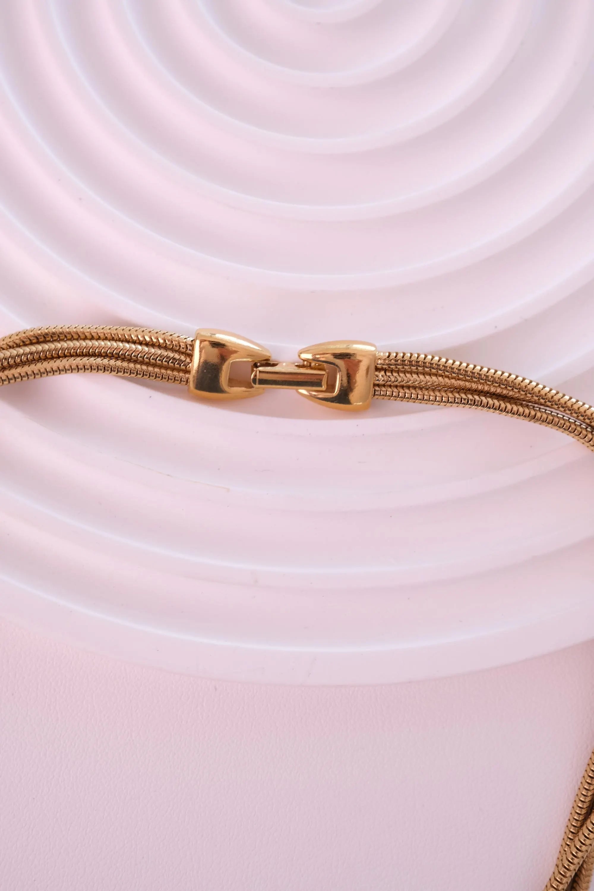 Vintage Givenchy gold chain necklace with secure clasp and signed pendant