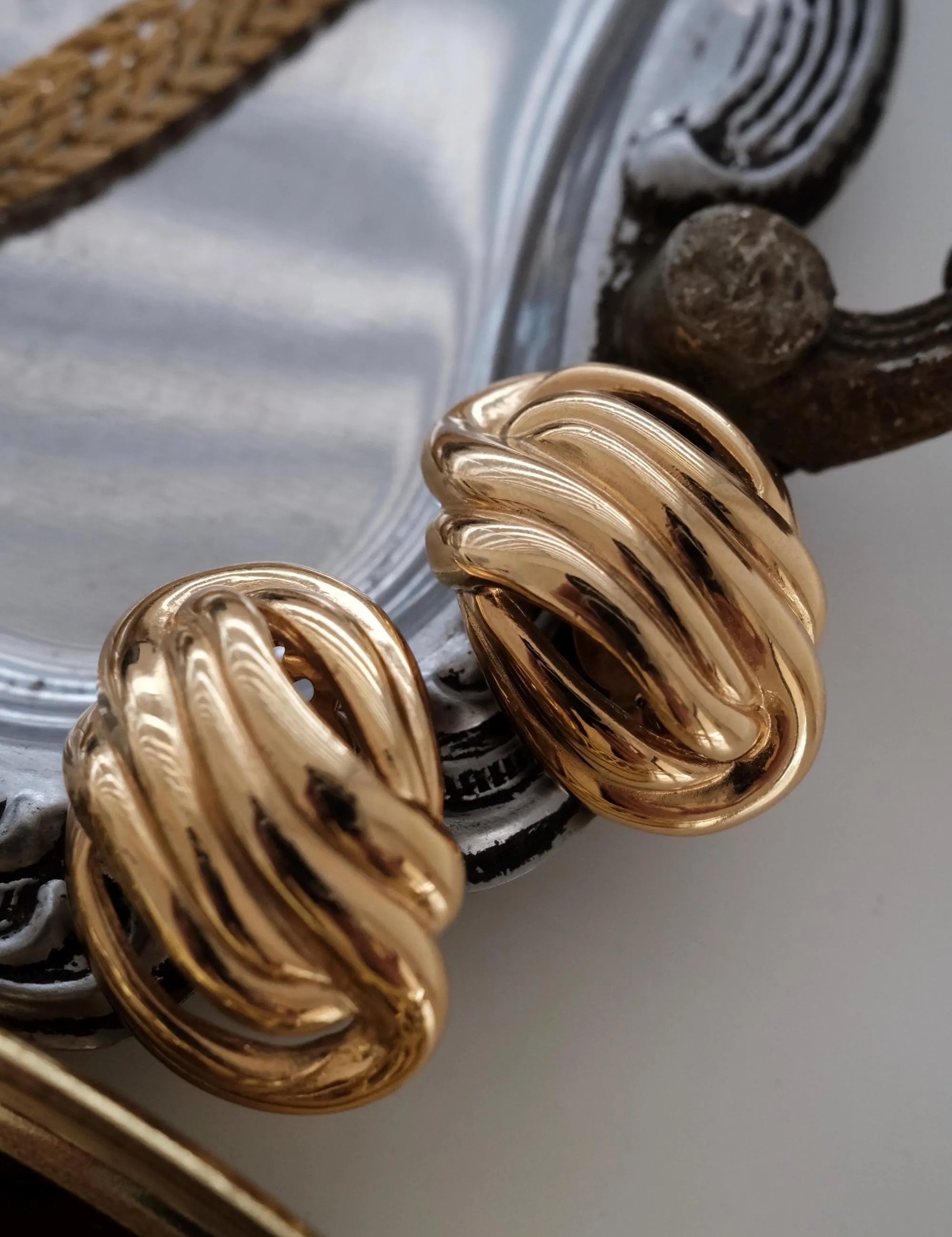 Elegant vintage Givenchy gold knot clip on earrings timeless luxury for sophisticated women