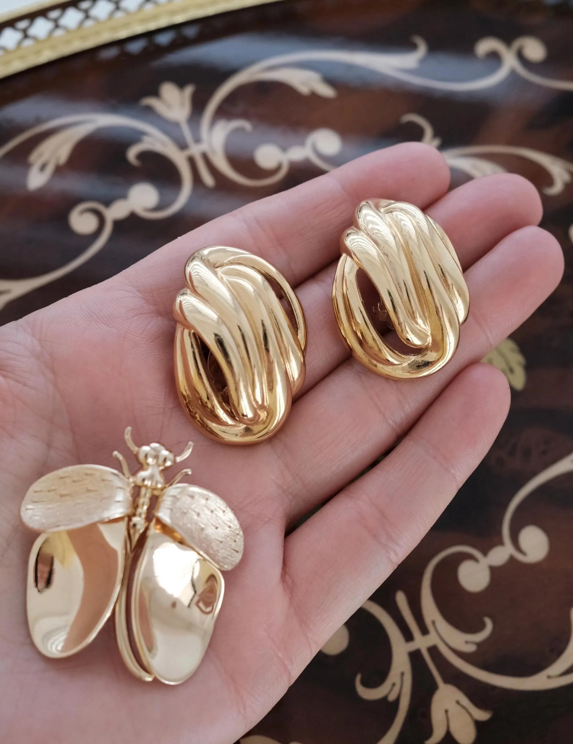 Elegant vintage Givenchy gold knot clip on earrings timeless luxury for sophisticated women