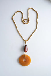 Vintage Givenchy gold pendant necklace amber resin elegant designer jewelry