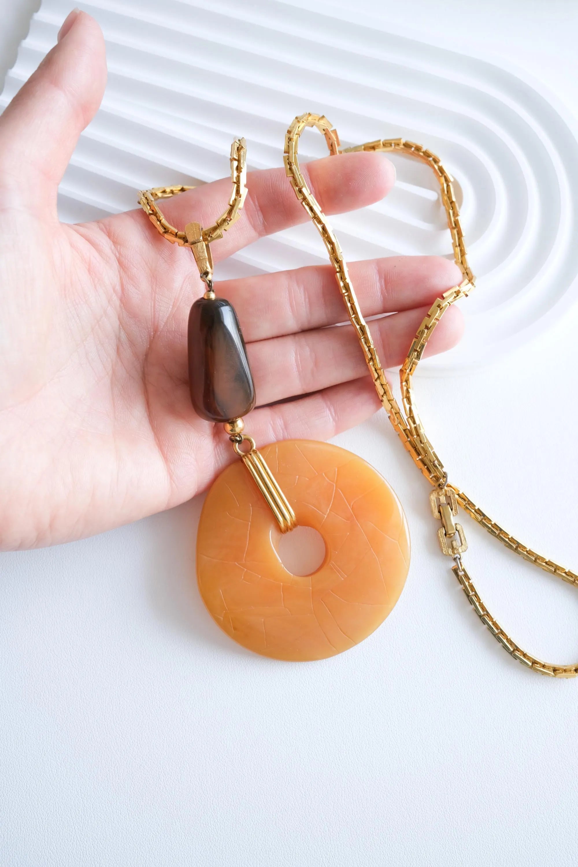 Givenchy long chain pendant necklace on neck refined statement style