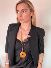 Vintage Givenchy necklace styled with outfit 70s chic luxury look