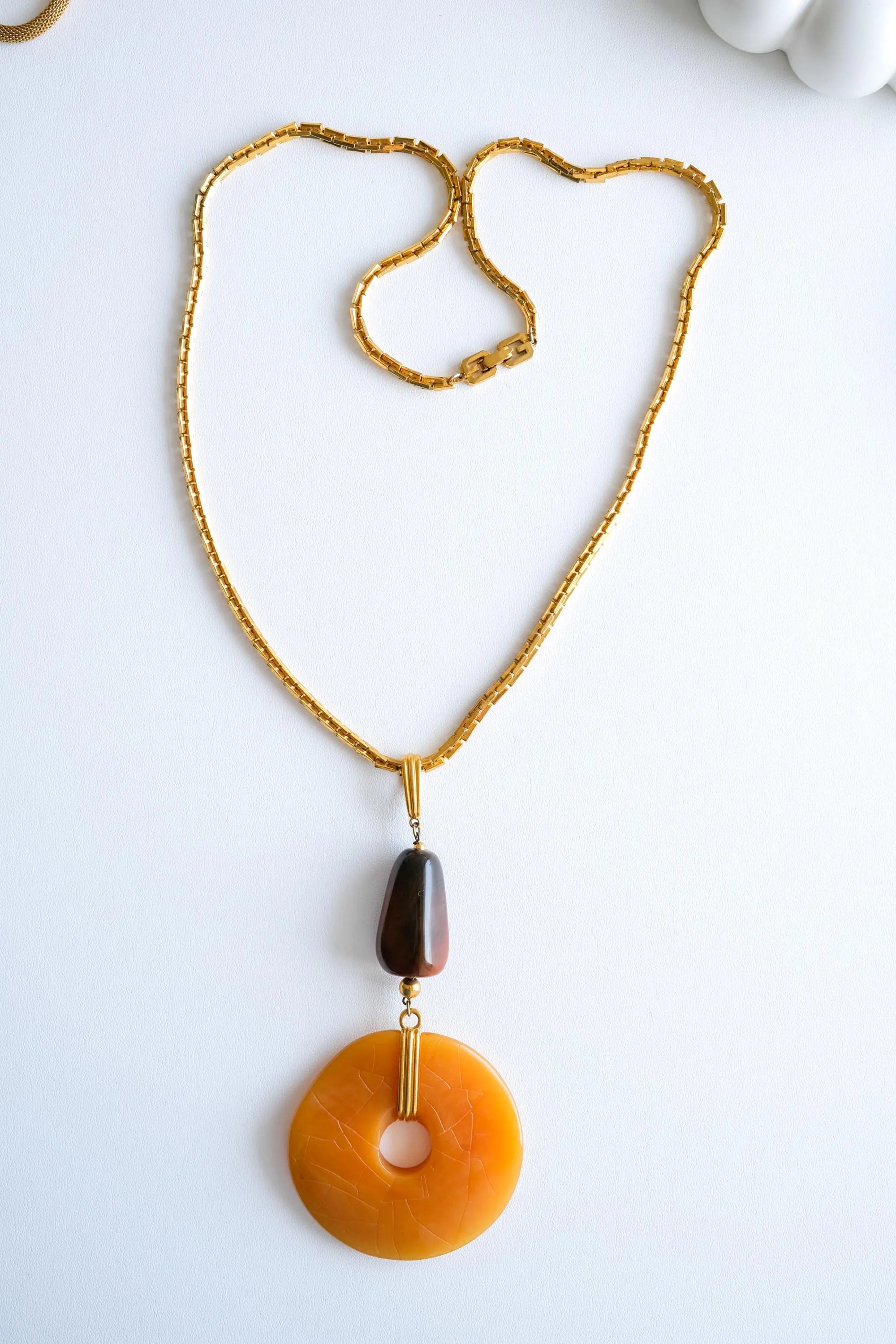 Givenchy pendant necklace side view sculptural refined design