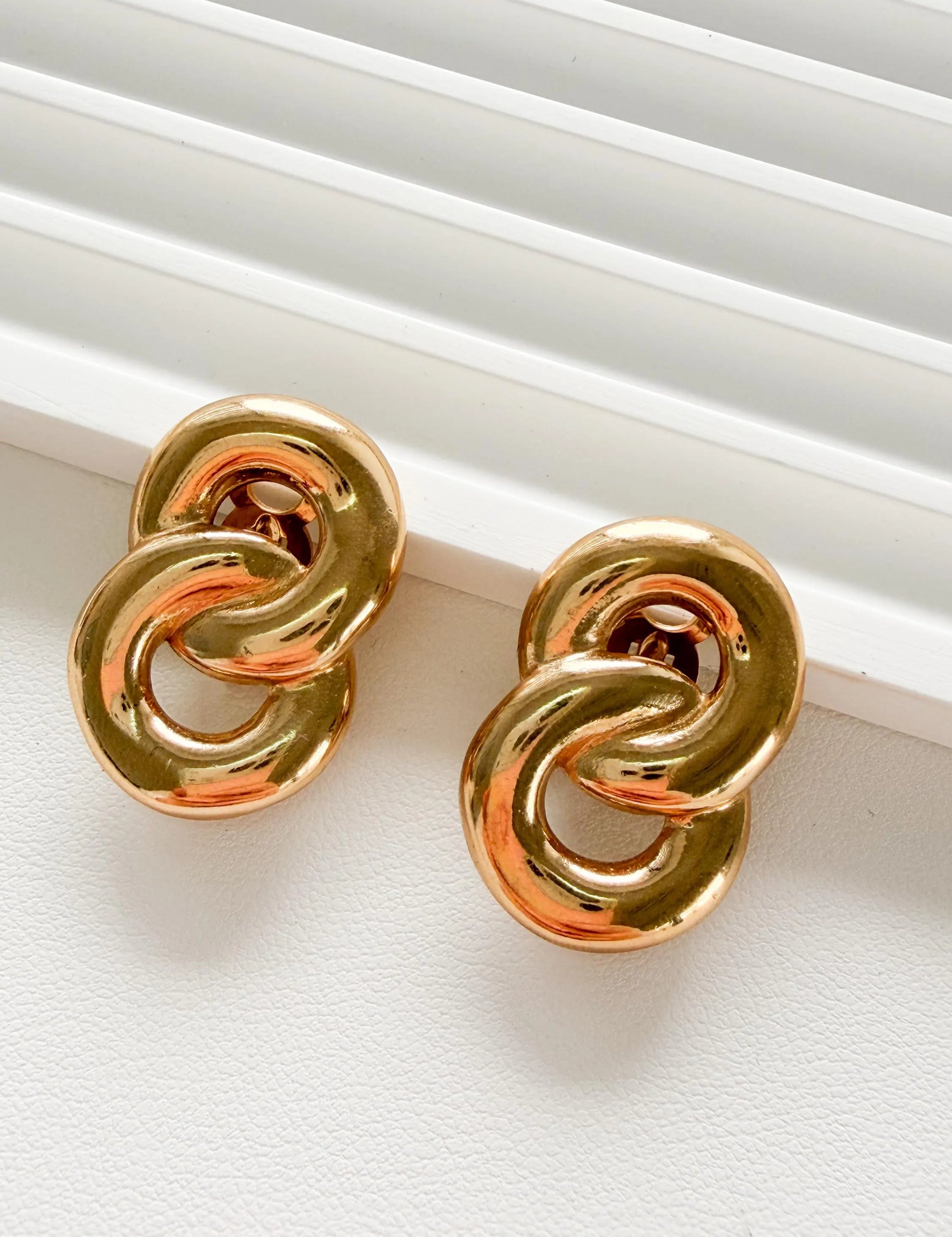Elegant vintage Givenchy gold rope clip on earrings refined timeless luxury jewelry