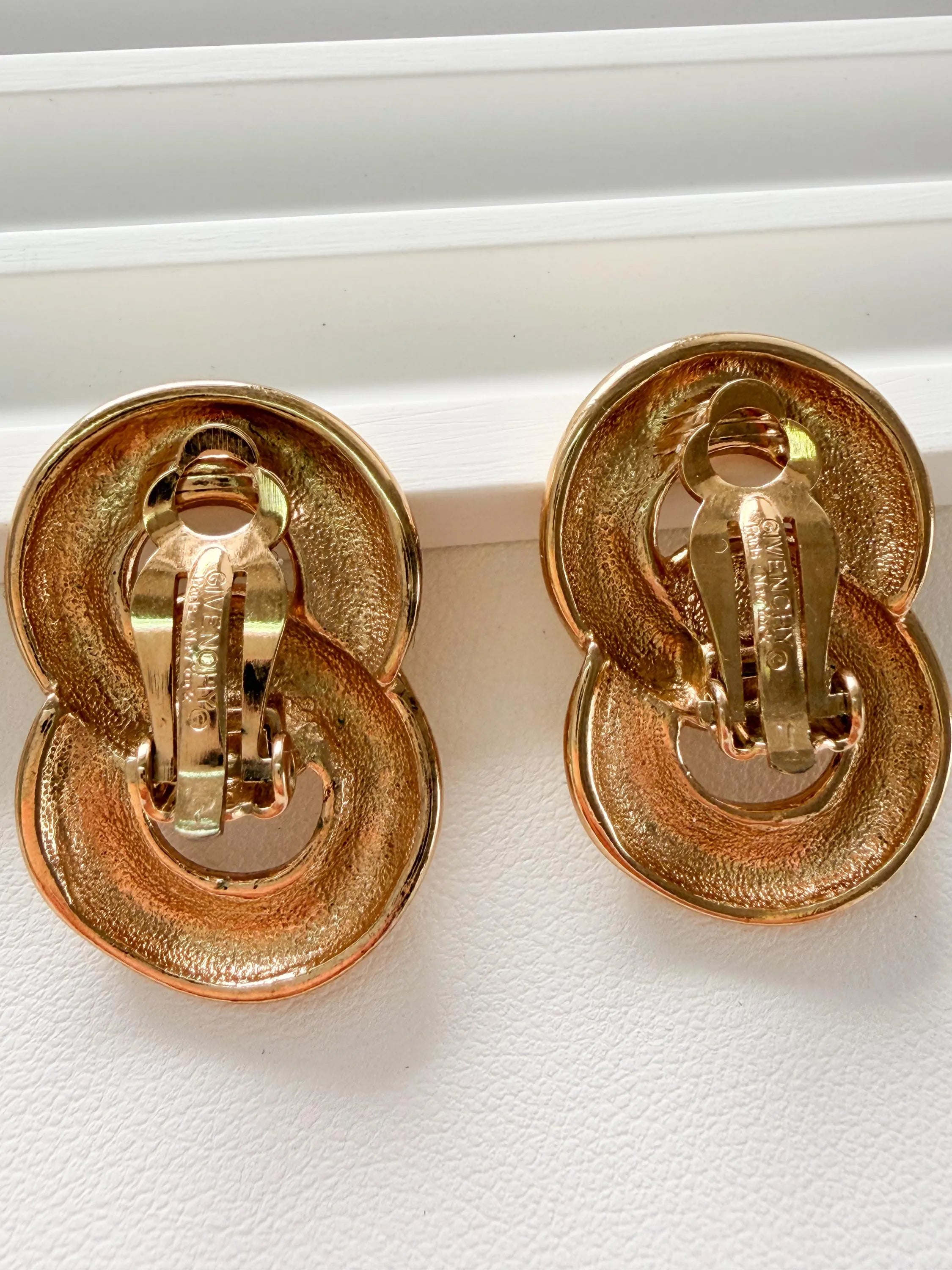 
Givenchy vintage gold rope earrings clip on sophisticated luxury accessory