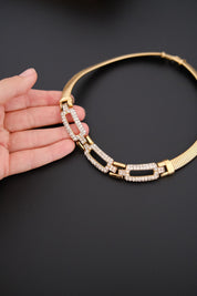 Vintage Givenchy gold-tone choker necklace with crystal-set geometric links 