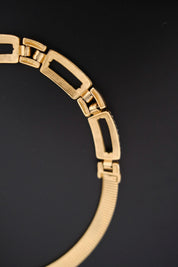 Vintage Givenchy gold-tone choker necklace with crystal-set geometric links 