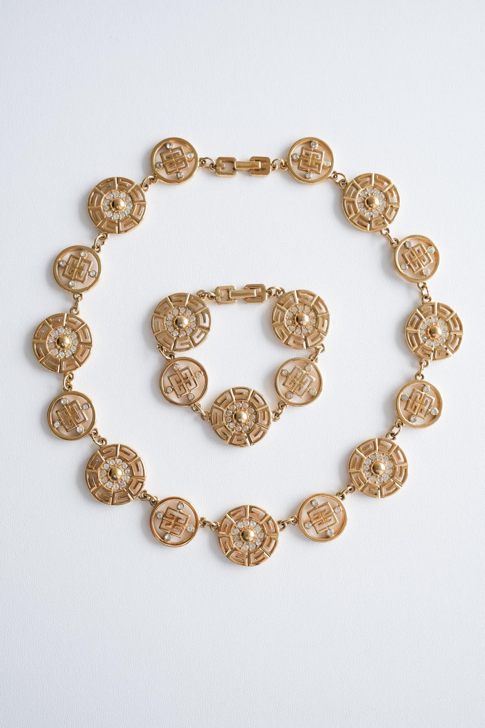 Vintage Givenchy Logo Gold Necklace Bracelet Set Elegant Classic Luxury accessory for refined women
