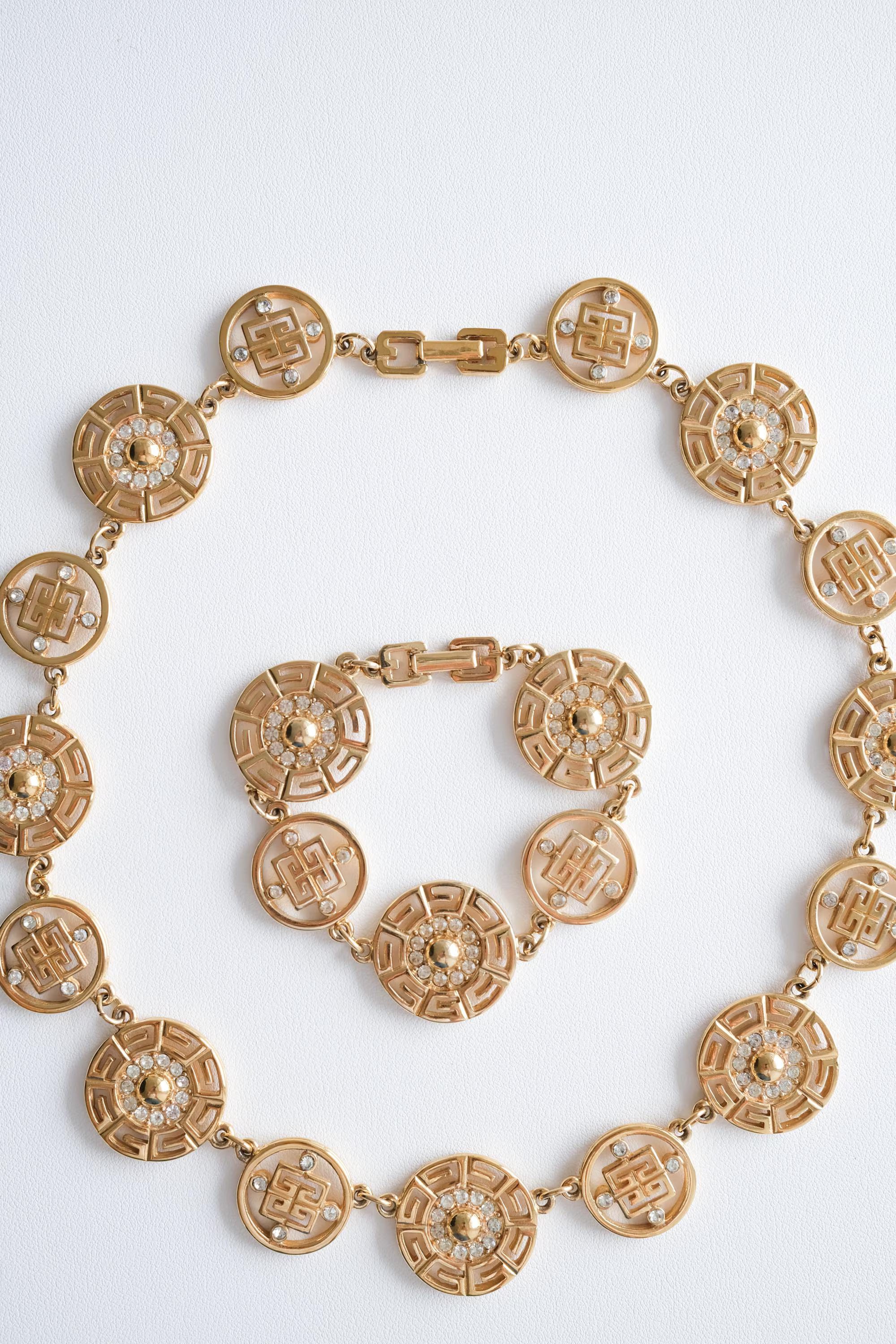 Vintage Givenchy Logo Gold Necklace Bracelet Set Elegant Classic Luxury accessory for refined women