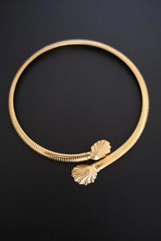 Vintage Givenchy gold-tone flexible shell choker necklace with sculptural open-front collar design