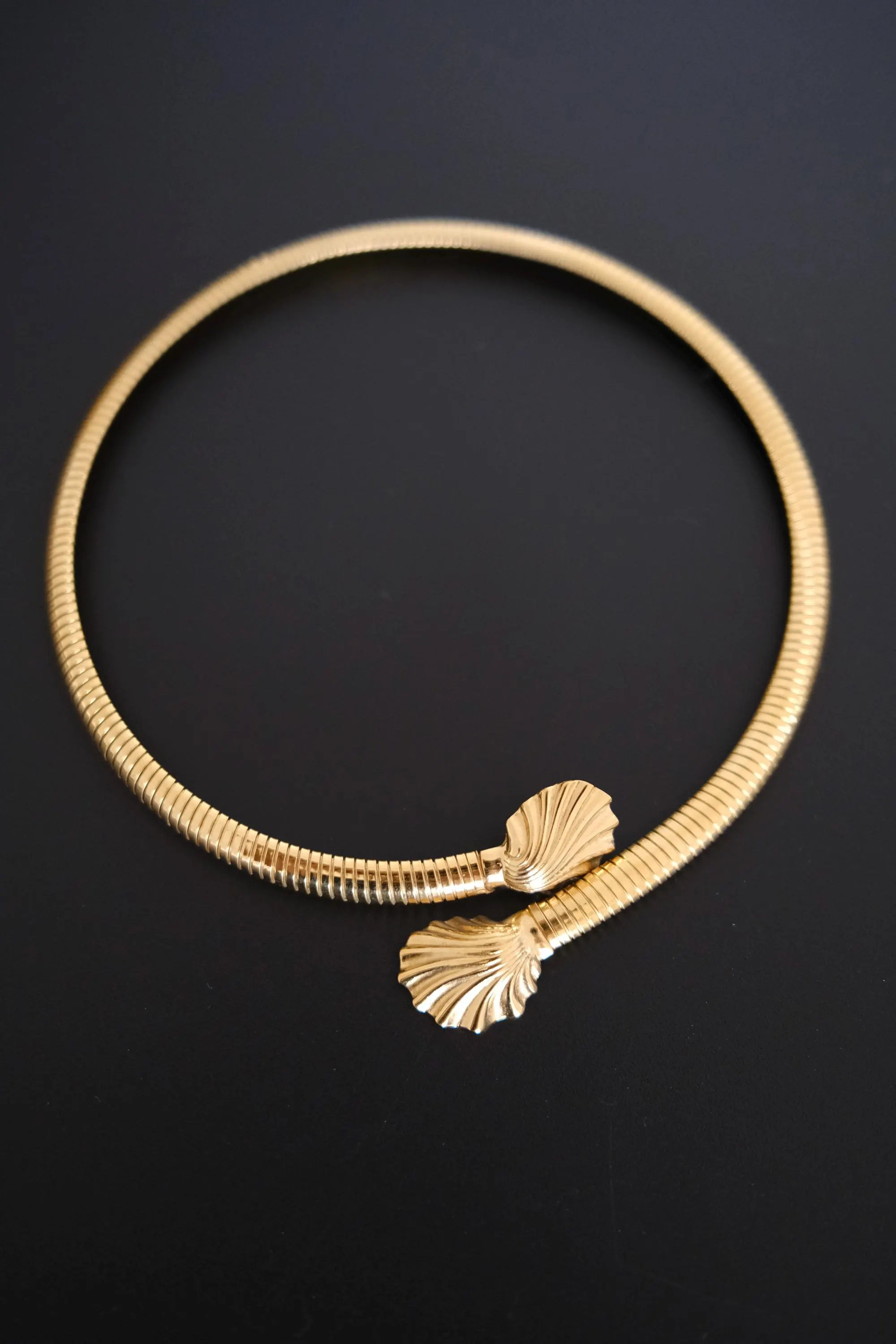 Vintage Givenchy gold-tone flexible shell choker necklace with sculptural open-front collar design