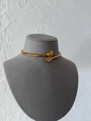 Vintage Givenchy gold-tone shell collar necklace worn closely around the neckline