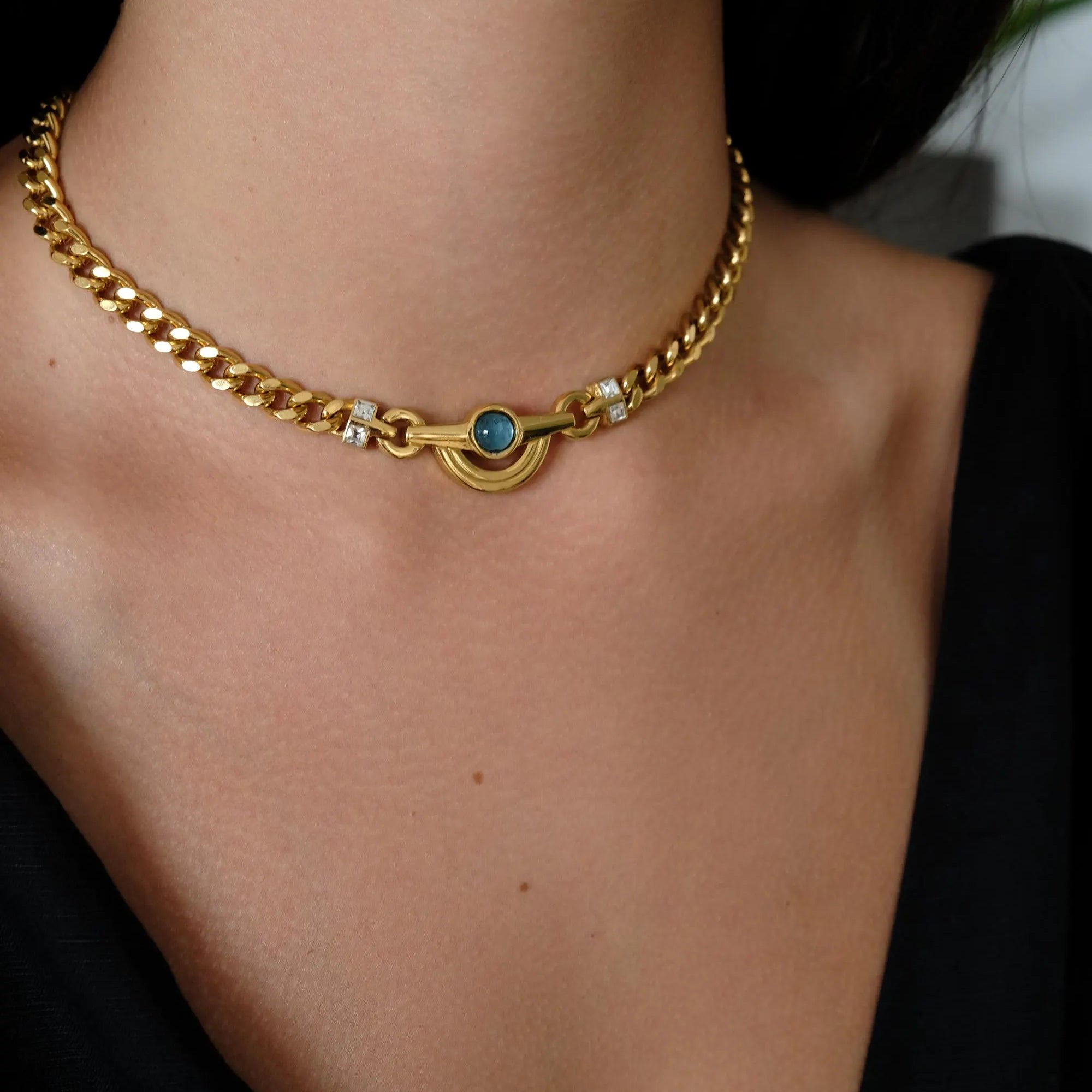 Vintage_Givenchy_Necklace_Gold_Tone_Curb_Chain_with_Light_Blue_Cabochon_Crystal_Accents_1.webp