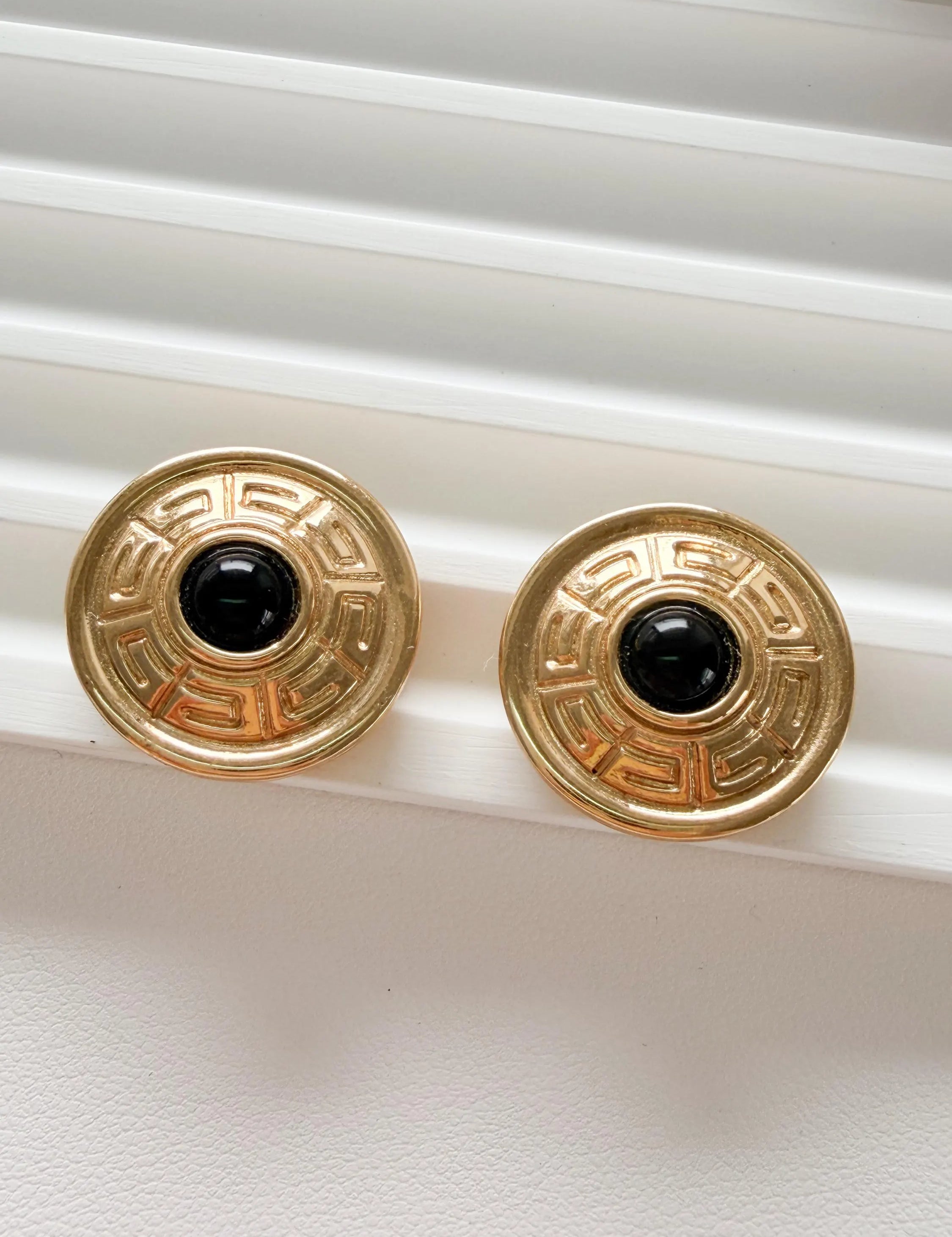 Elegant vintage Givenchy gold round clip on earrings refined timeless luxury jewelry, black cabochon