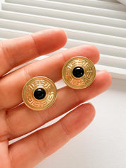 Elegant vintage Givenchy gold round clip on earrings refined timeless luxury jewelry, black cabochon