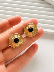 Elegant vintage Givenchy gold round clip on earrings refined timeless luxury jewelry, black cabochon Authentic designer accessory  
