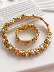 Elegant vintage gold choker necklace faux pearl bracelet set refined timeless luxury jewelry