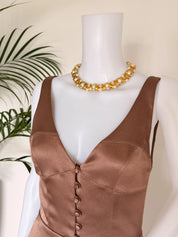 Gold choker necklace on neck elegant feminine style refined luxury look