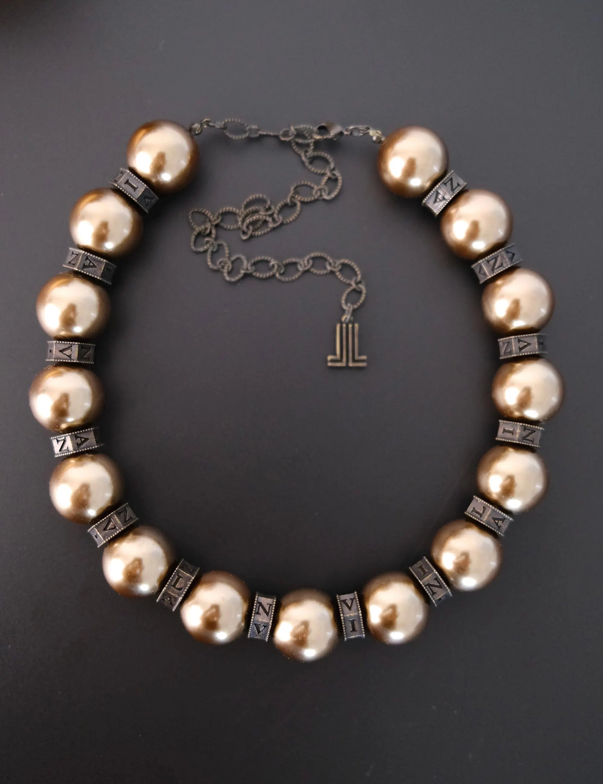 Vintage Lanvin statement necklace with large champagne faux pearls and LL logo charm