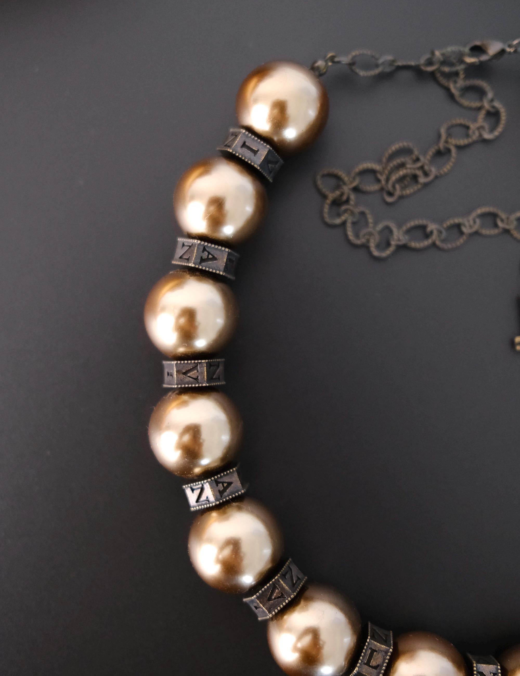 Vintage Lanvin statement necklace with large champagne faux pearls and LL logo charm
