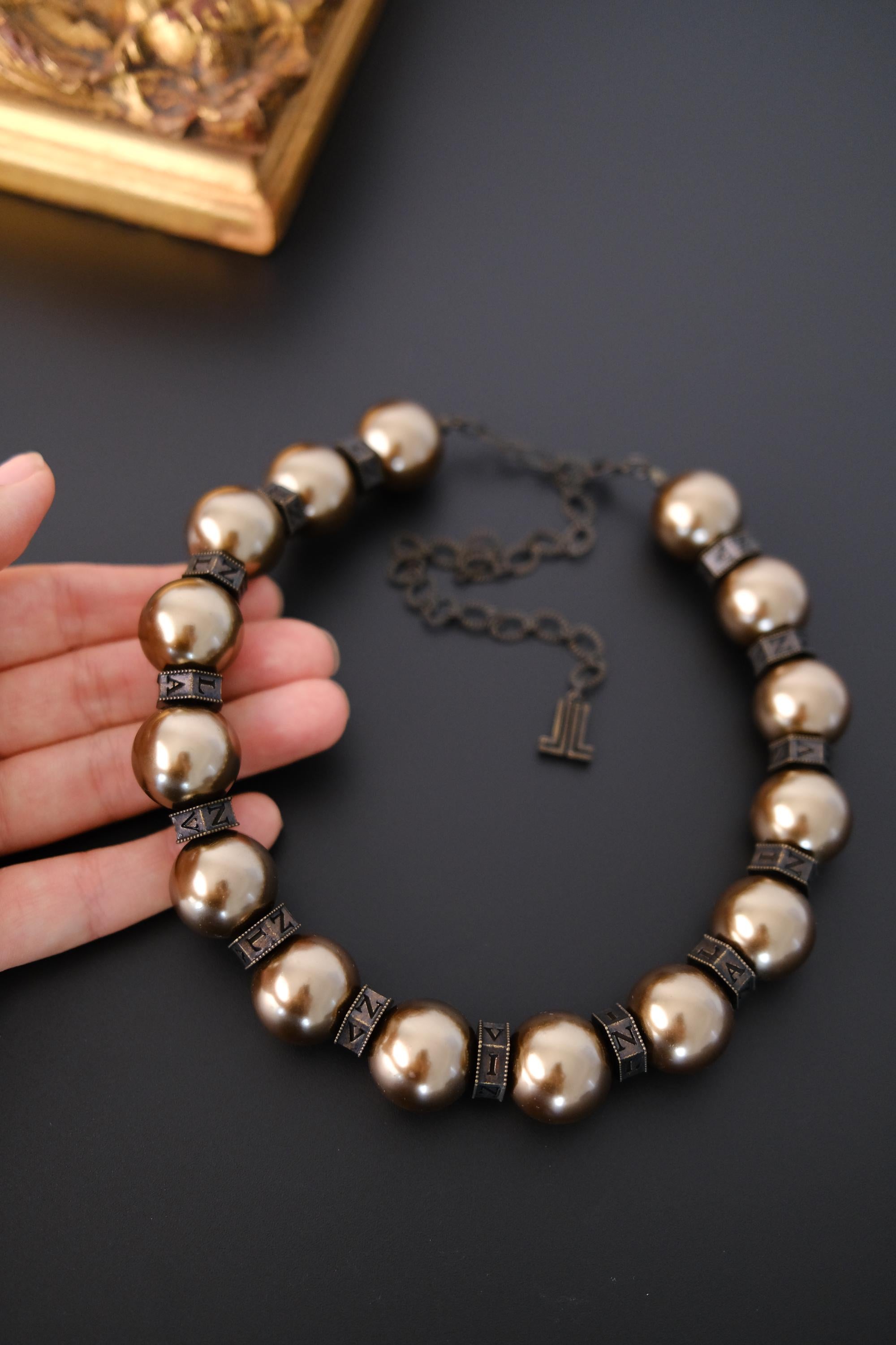 Vintage Lanvin statement necklace with large champagne faux pearls and LL logo charm