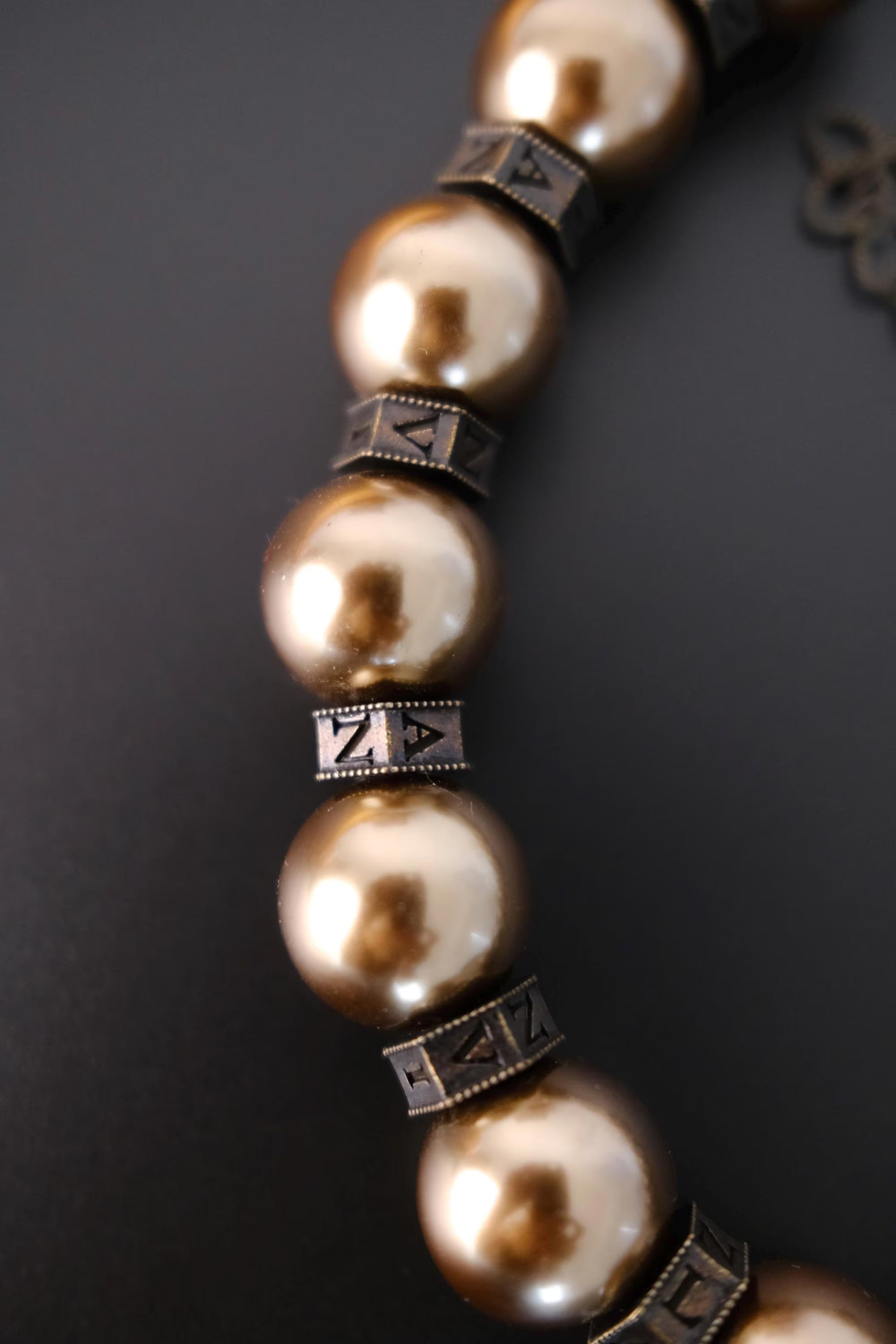 Vintage Lanvin statement necklace with large champagne faux pearls and LL logo charm