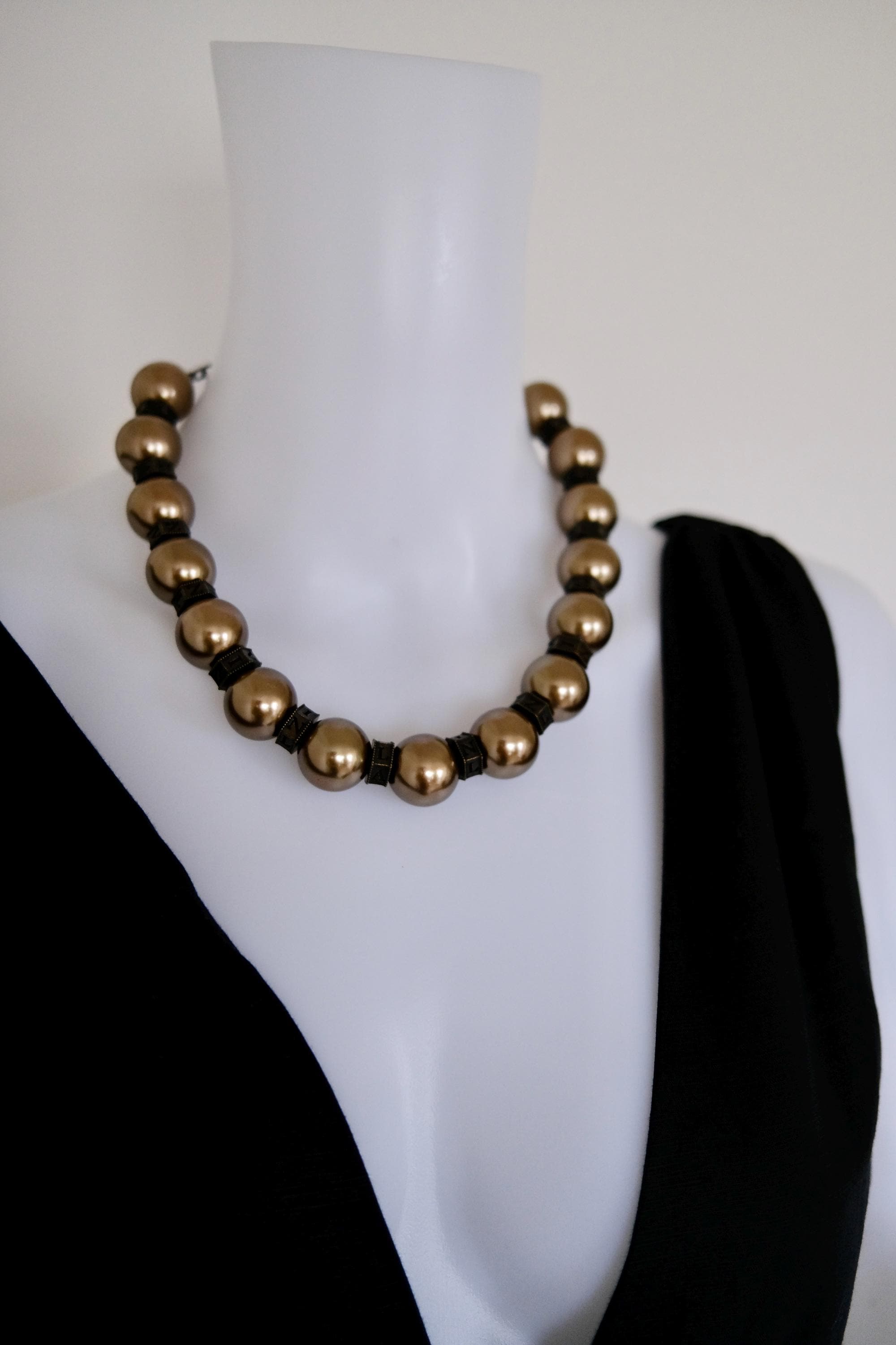 Vintage Lanvin statement necklace with large champagne faux pearls and LL logo charm