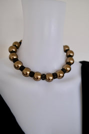 Vintage Lanvin statement necklace with large champagne faux pearls and LL logo charm