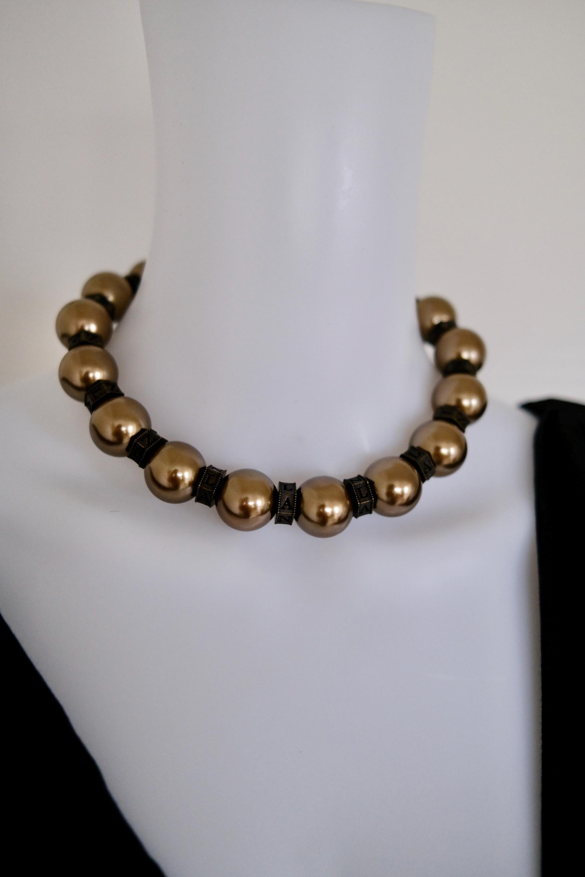 Vintage Lanvin statement necklace with large champagne faux pearls and LL logo charm