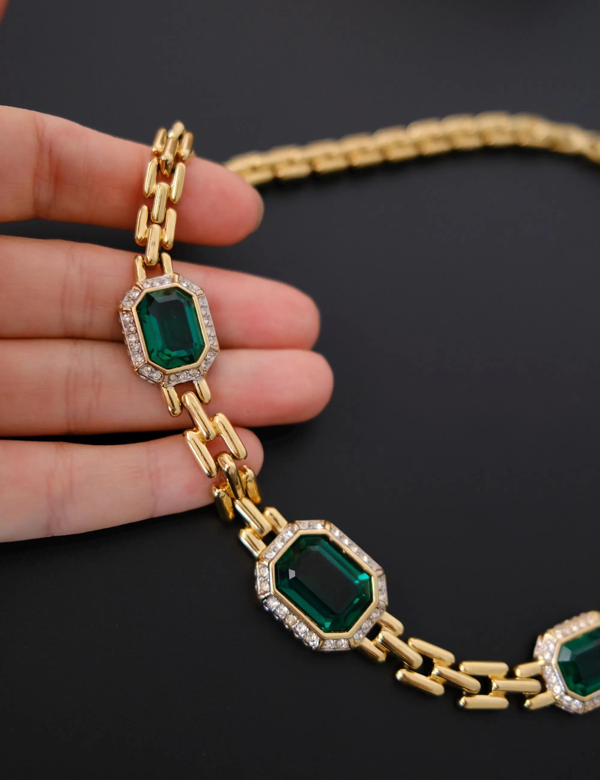 Vintage 1980s Nina Ricci emerald green choker necklace with gold-tone chain and crystal accents
