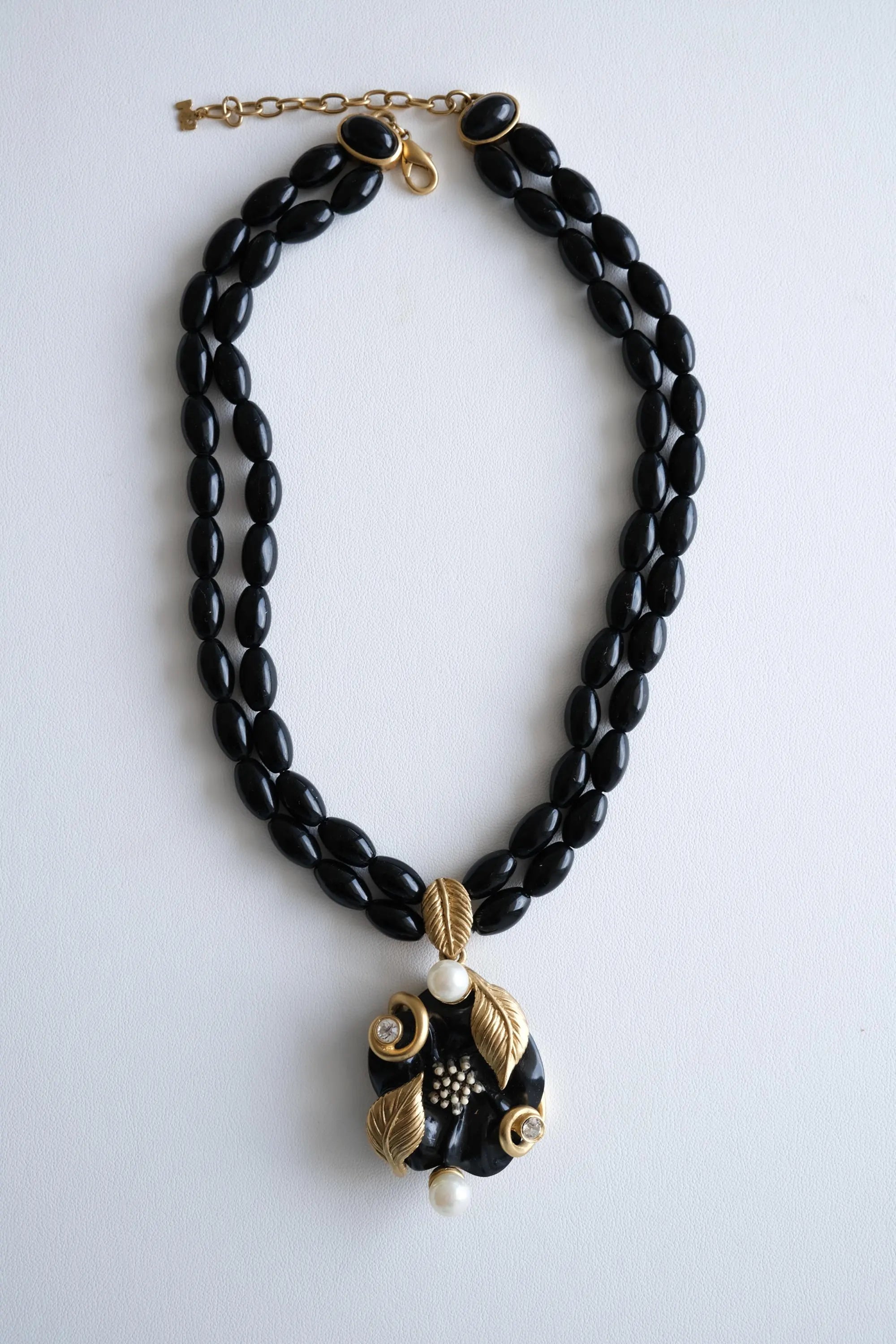 Elegant vintage Nina Ricci black glass bead choker necklace gold leaf pearl pendant luxury