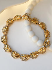 Vintage Nina Ricci choker necklace with gold leaf wheat motif and crystal details