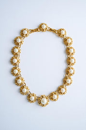 Elegant vintage Nina Ricci gold floral faux pearl choker refined Parisian luxury