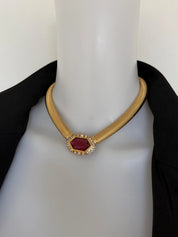 Nina Ricci vintage ruby-red glass statement choker necklace styled with an elegant black evening dress