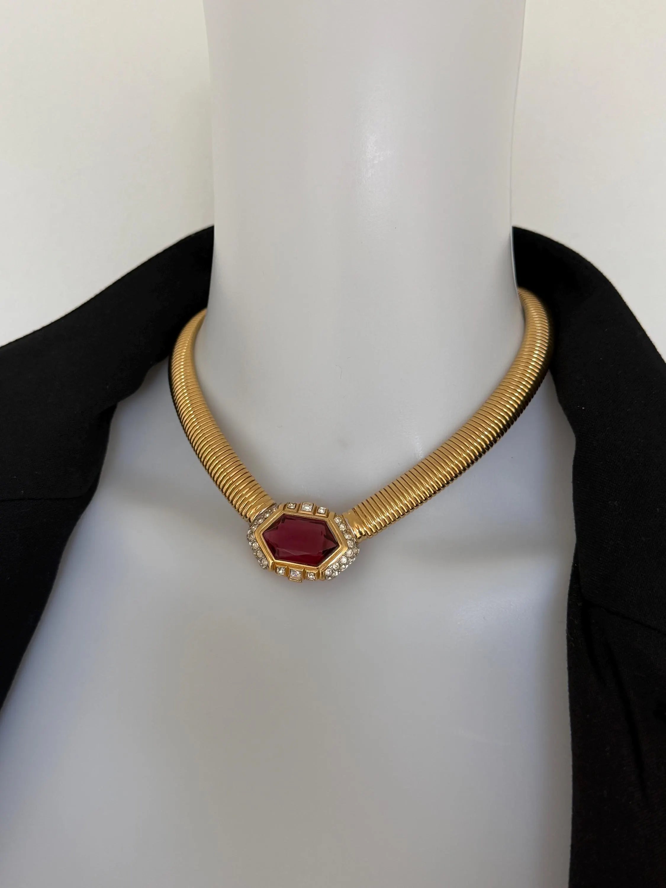Nina Ricci vintage ruby-red glass statement choker necklace styled with an elegant black evening dress