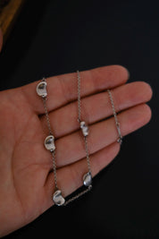 Vintage Tiffany & Co Elsa Peretti Five Bean sterling silver necklace measuring approximately 41 cm in length
