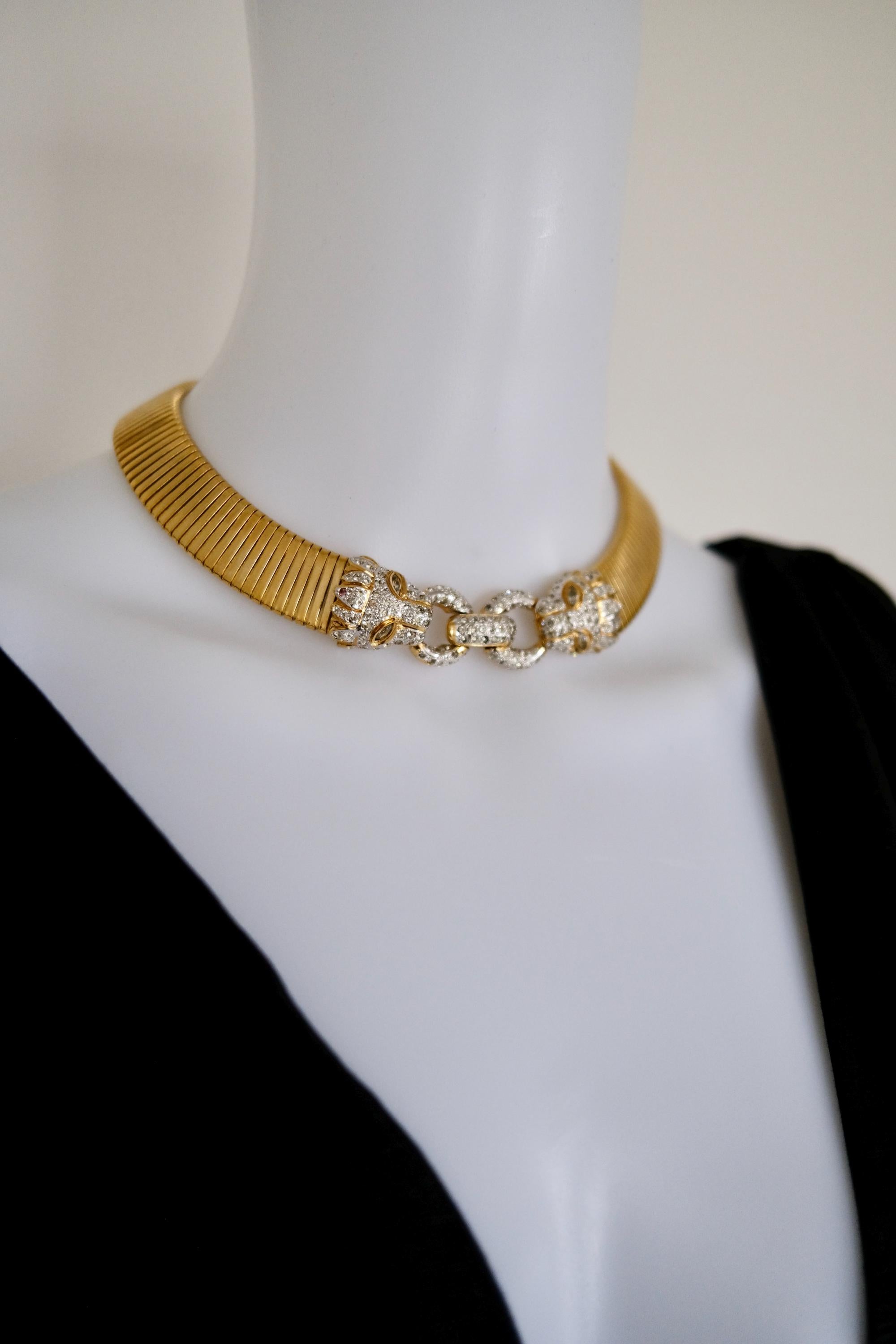 Vintage Vogue Bijoux gold-tone collar choker with two crystal pavé feline heads and hidden front closure