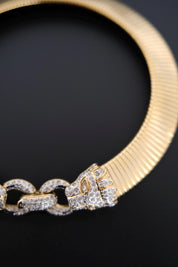 Vintage Vogue Bijoux gold-tone collar choker with two crystal pavé feline heads and hidden front closure