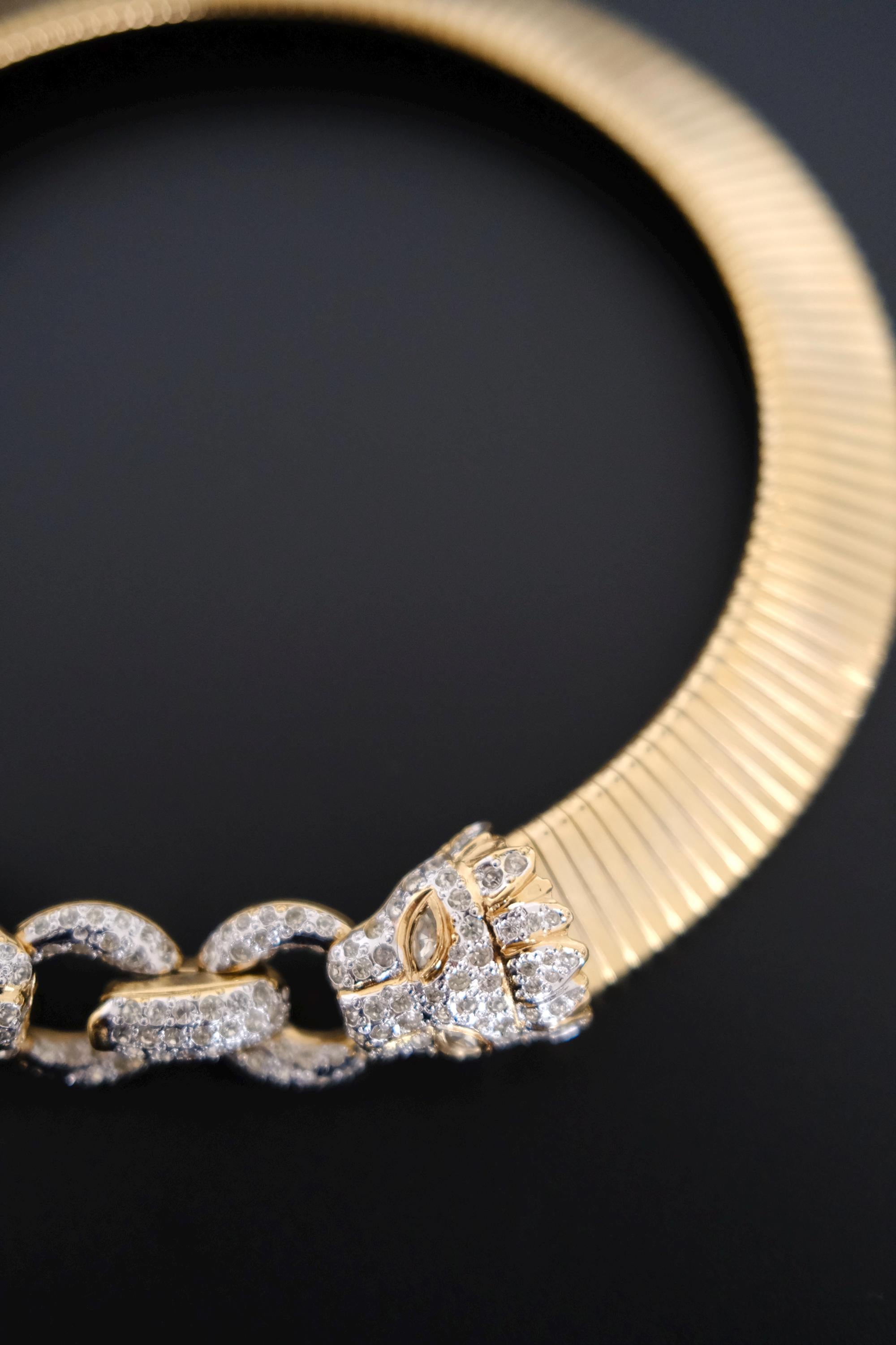 Vintage Vogue Bijoux gold-tone collar choker with two crystal pavé feline heads and hidden front closure