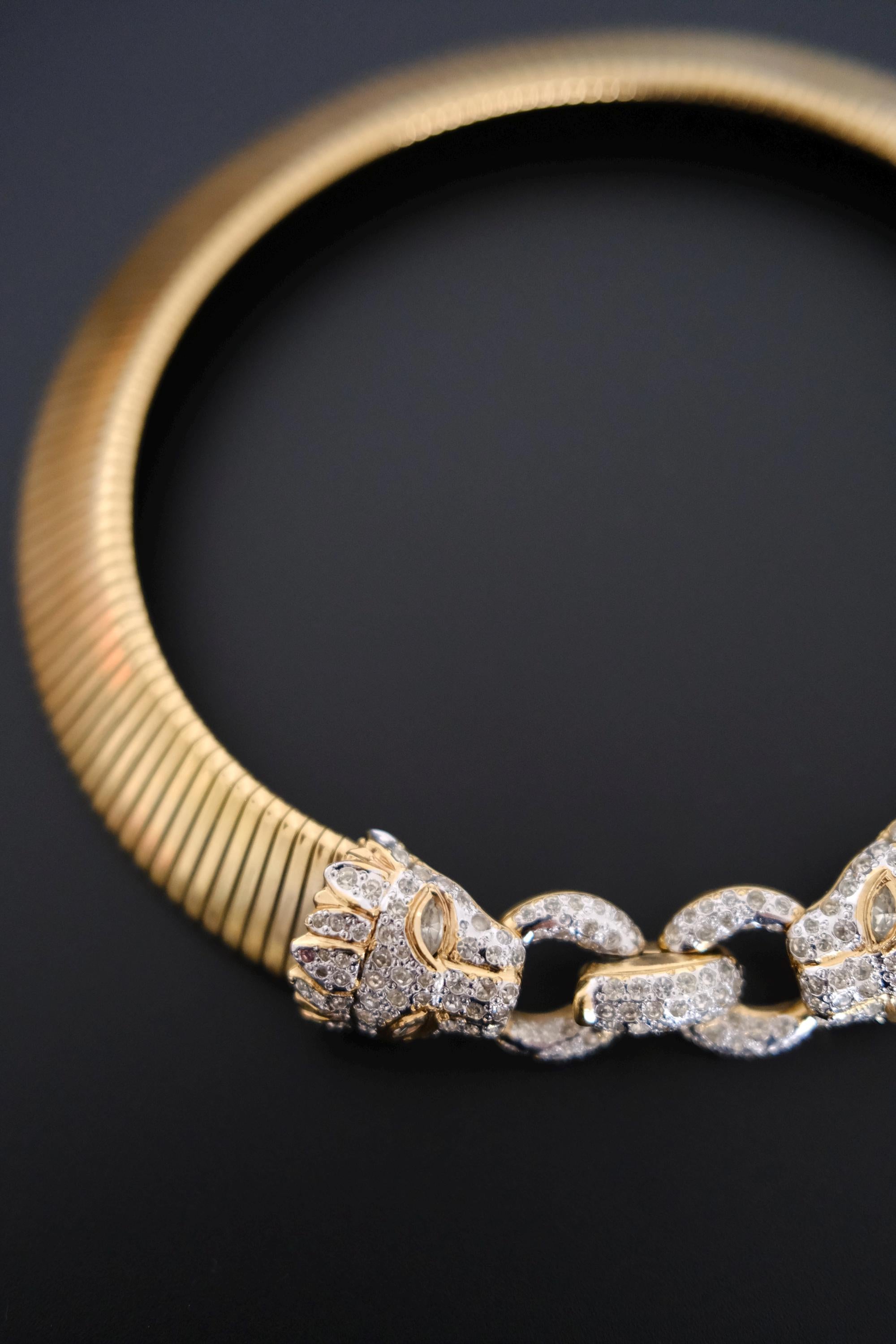 Vintage Vogue Bijoux gold-tone collar choker with two crystal pavé feline heads and hidden front closure