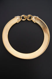 Vintage Vogue Bijoux gold-tone collar choker with two crystal pavé feline heads and hidden front closure
